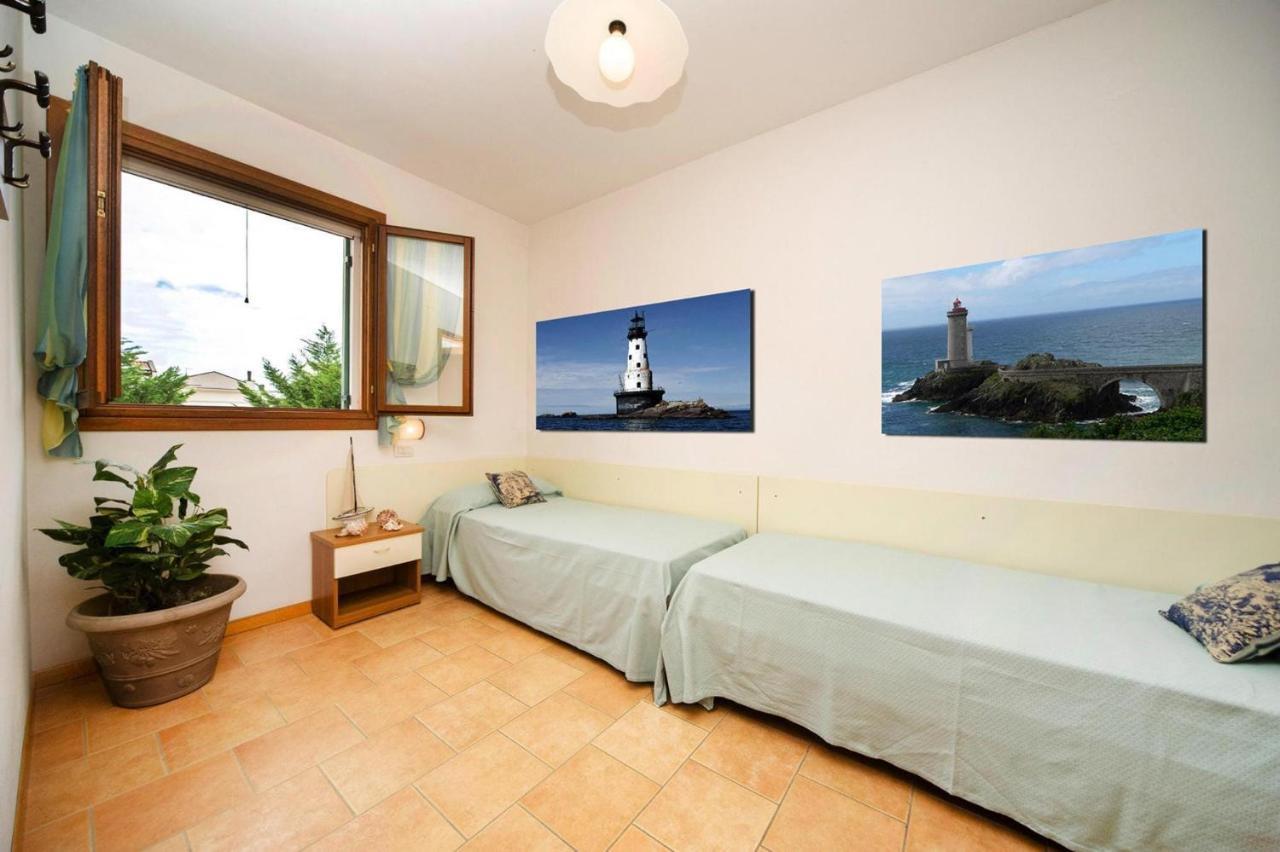 Terraced House In The Ca' Del Pino Holiday Complex With Communal Pool In Bibione Exterior photo